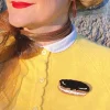 Erstwilder Eclair Au Chocolat Brooch* Brooches